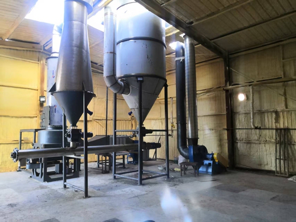Rotating flash dryer